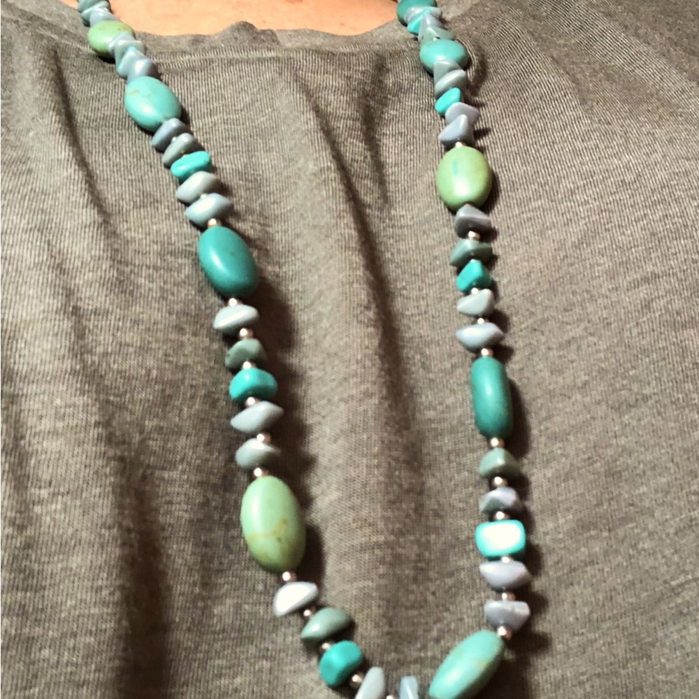 Turquoise necklace with sterling fixture.
